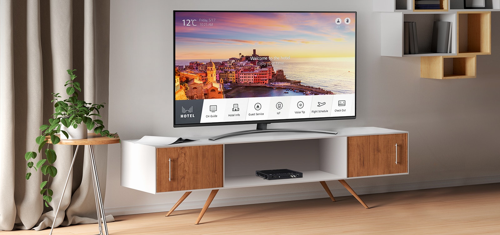There is a simulated image to show Pro:Centric Set Top Box, STB-6500, installed in the hotel room. The TV connected to STB-6500 provides various information and services to guests.